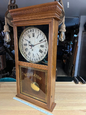 E. Ingraham Co. calendar pendulum wall clock