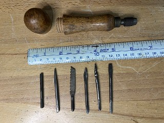 Antique tool handle with 6 tool bits Antique tool handle with 6 tool bits
