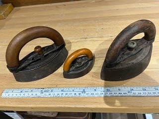 Antique irons with removeable wood handles