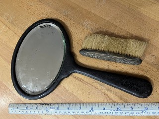 Antique hand held ebony wood handled oval beveled mirror Antique hand held ebony wood handled oval beveled mirror