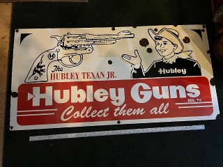 Vintage Hubley Guns, The Hubley Texan Jr. Collect Them All, Porcelain Enamel sign, 48-inch by 24-inch.