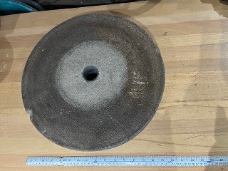 New old stock, 16 inch x 3 inch grinding wheel for a very large hand crank or treadle grinder, weighs 50 lbs. with 1 1/2 inch arbor hole