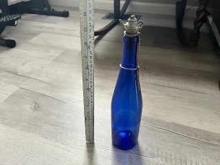 Vintage cobalt blue bottle with solid brass kettle cork topper Vintage cobalt blue bottle with solid brass kettle cork topper