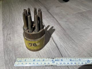 Vintage 8 piece set, knurled hollow punches made by Syracuse Twist Drill Co. with wood holder stand. Vintage 8 piece set, knurled hollow punches made by Syracuse Twist Drill Co. with wood holder stand.