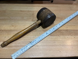 Antique mallet 3 1/4 inch mallet with steel rings, was used for knocking in wood pegs. Antique mallet 3 1/4 inch mallet with steel rings, was used for knocking in wood pegs.