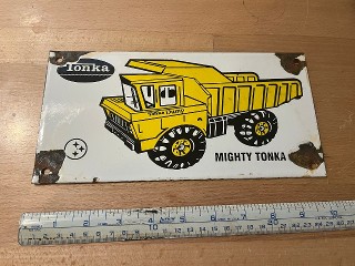 Vintage Tonka, Mighty Tonka Dump Truck, it measures 10 x 5 porcelain enamel sign.