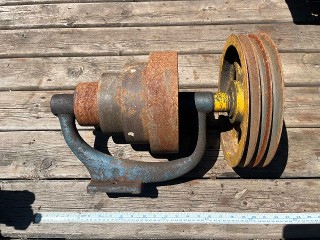 Step pulley and V-belt pulley with base from an antique 1883 W.F. & J. Barnes camel back drill press. Step pulley and V-belt pulley with base from an antique 1883 W.F. & J. Barnes camel back drill press.