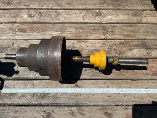 Large and small step pulleys with shaft from an antique 1883 W.F. & J. Barnes camel back drill press. Large and small step pulleys with shaft from an antique 1883 W.F. & J. Barnes camel back drill press.