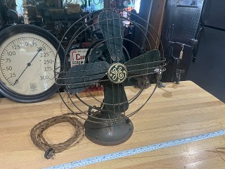 Antique 1934 GE 12-inch oscillating electric fan, working condition, could use new wires. Antique 1934 GE 12-inch oscillating electric fan, working condition, could use new wires.
