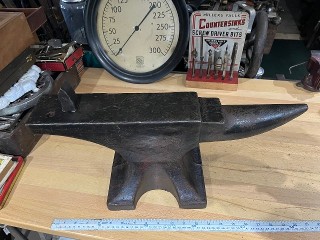 Vintage unledgeble name 70 lb. anvil with a 3/4-inch hardie hole, it measures 20 x 3 1/4 x 9 Vintage unledgeble name 70 lb. anvil with a 3/4-inch hardie hole, it measures 20 x 3 1/4 x 9