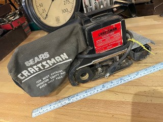 Sears Craftsman belt sander, uses 3-inch by 21-inch belts, with dust collector bag. Sears Craftsman belt sander, uses 3-inch by 21-inch belts, with dust collector bag.
