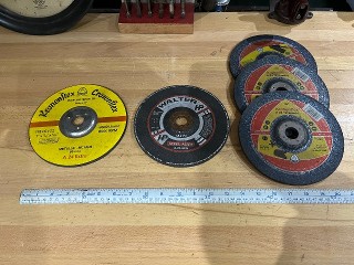 New 7-inch by 1/4-inch grinding disc, two for steel and three for cast iron, New 7-inch by 1/4-inch grinding disc, two for steel and three for cast iron,