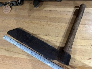 Antique hand forged froe, 12-inch edge, was repaired at one time. Antique hand forged froe, 12-inch edge, was repaired at one time.