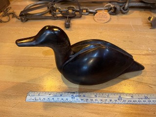 Beautiful carved walnut wood duck, it measures about 11 -inches long by 5 1/4 high, weighs 2 1/2 lbs. Beautiful carved walnut wood duck, it measures about 11 -inches long by 5 1/4 high, weighs 2 1/2 lbs.