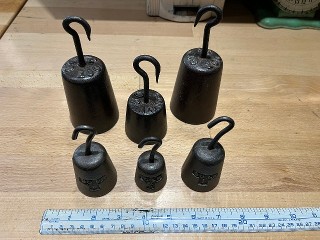 Antique balance scale weights Antique balance scale weights