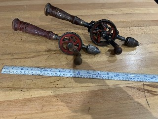 Antique hand drills, with hollow handle and screw off cap for bits, 3-jaw chuck, 10 and 12 inch Antique hand drills, with hollow handle and screw off cap for bits, 3-jaw chuck, 10 and 12 inch